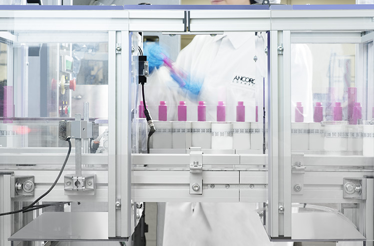 Automated cosmetic filling process under cleanroom conditions